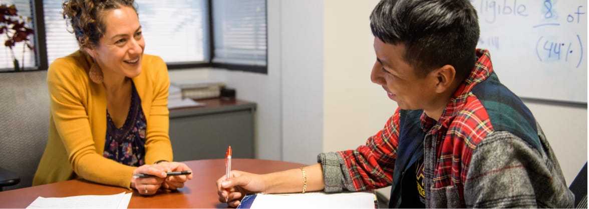 Student working with a professor