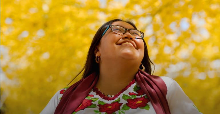 Woman looking up at the sky