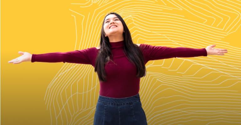 Woman standing with arms open