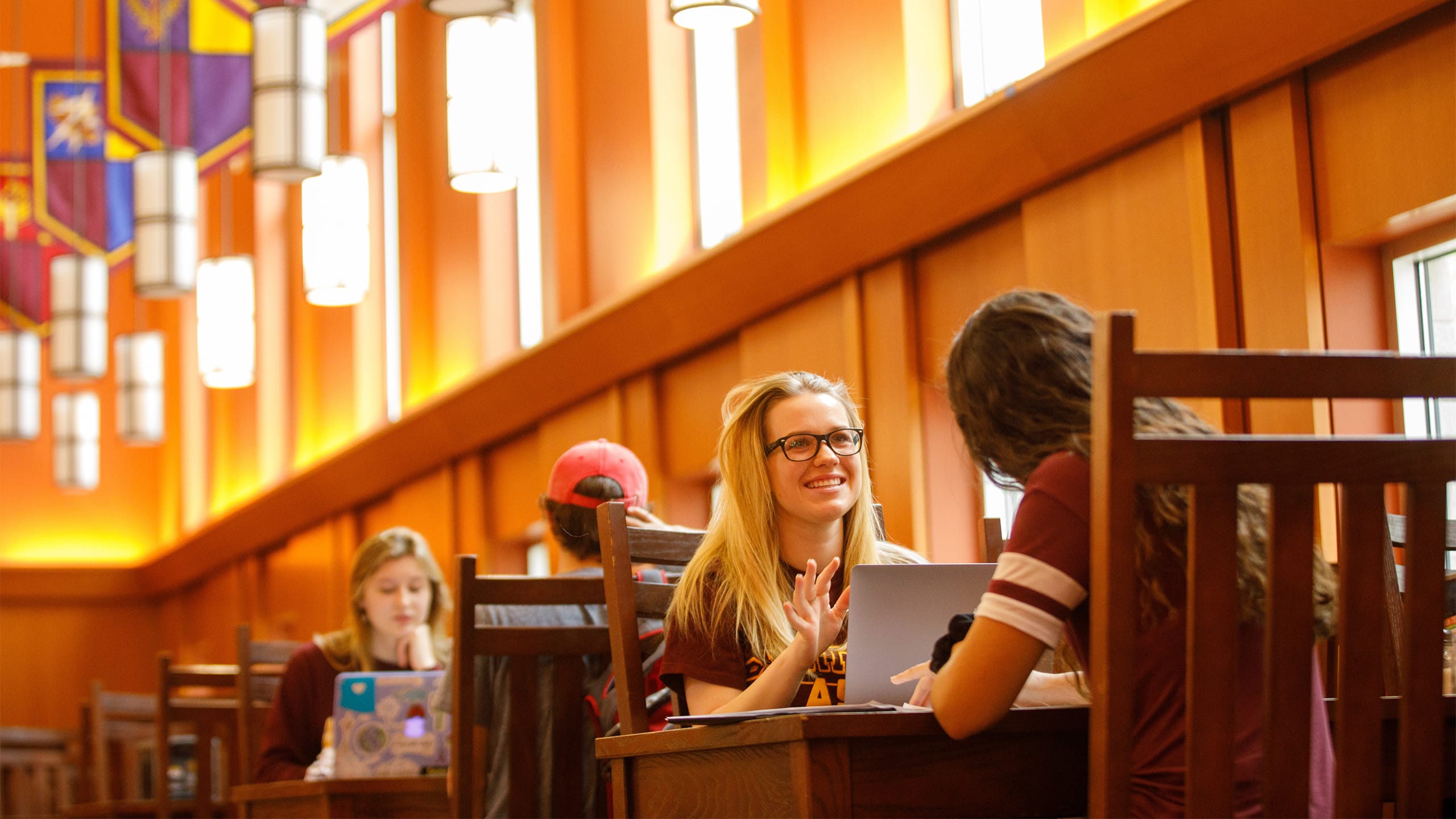 Students studying in library