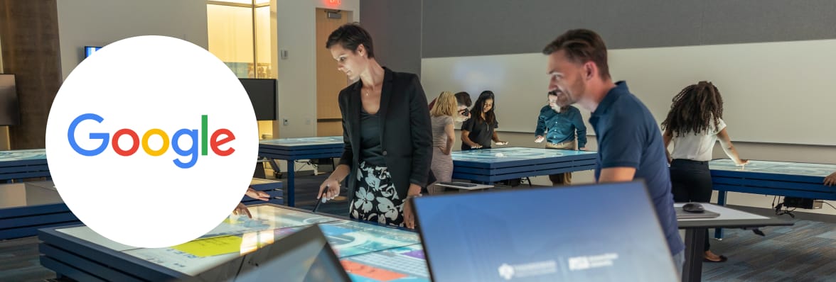 People working in a room with Google technology