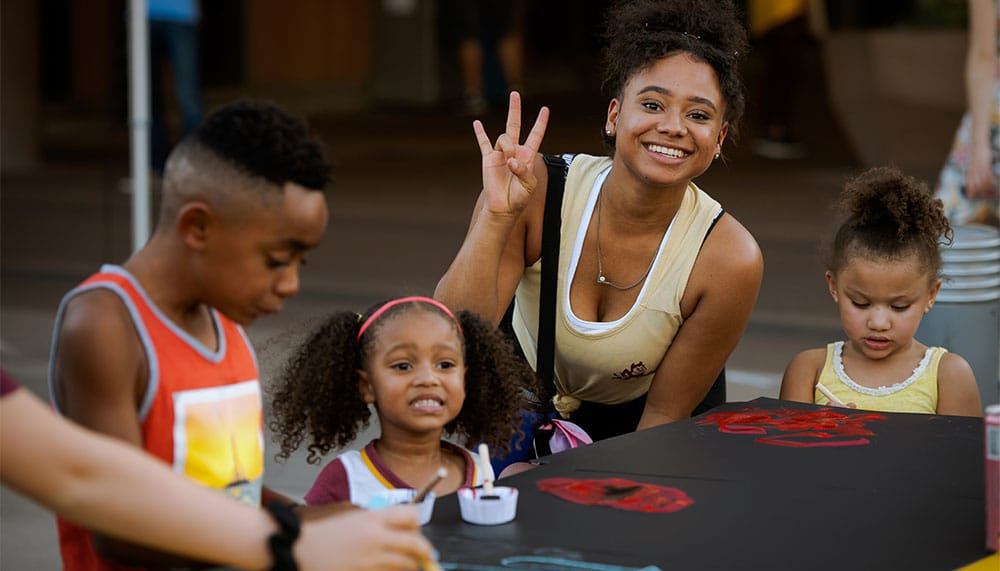 Woman and her children at ASU event