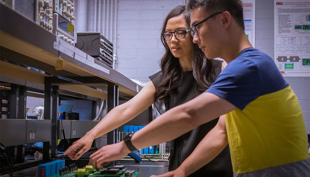 Two people working in a lab