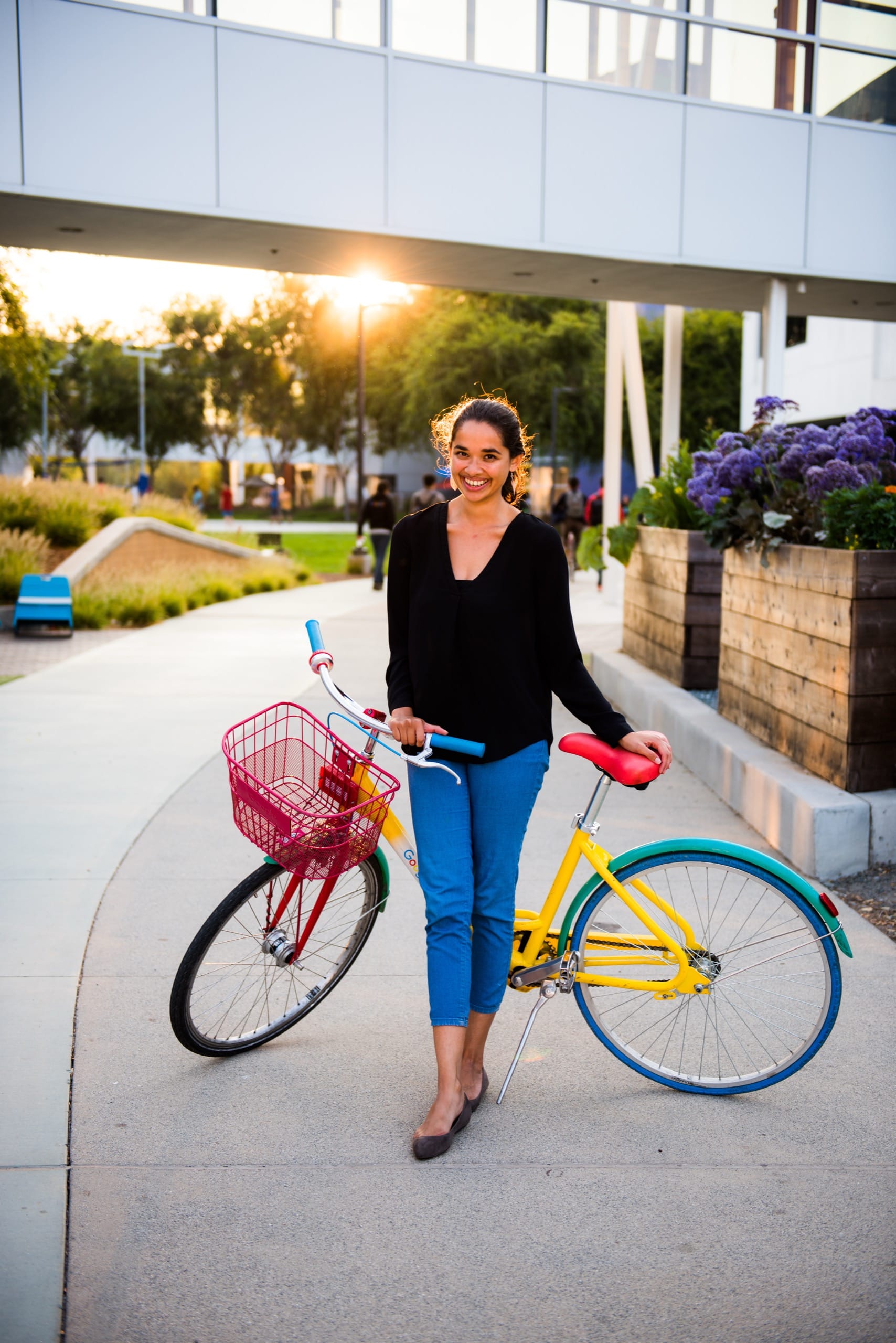 ASU student standing on campus with her bike